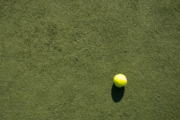 Top view tennis ball on the field