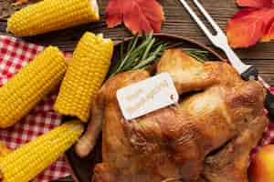 Free photo top view thanksgiving meal with turkey and corn