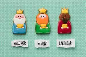 Free photo top view of three kings with crowns and names for epiphany day