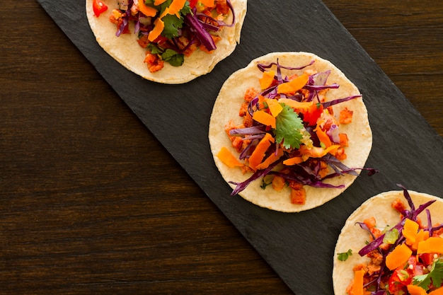 Top view tortilla with vegetables and meat