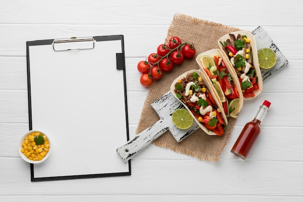 Top view tortillas with fresh meat and vegetables