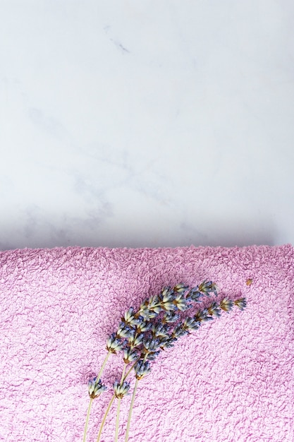 Free photo top view towel with lavender on