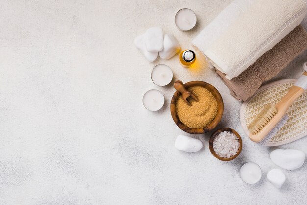 Top view towels with stones and candles