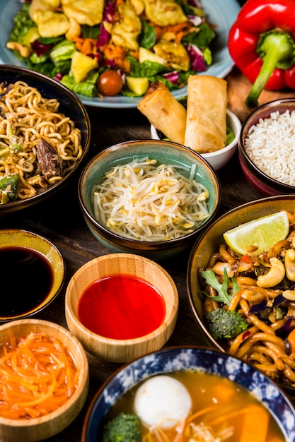 Free Photo top view of traditional thai food on a wooden table