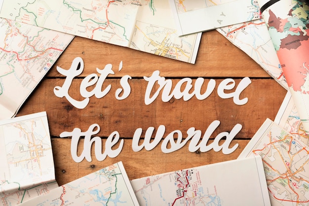 Free photo top view travel concept with world maps