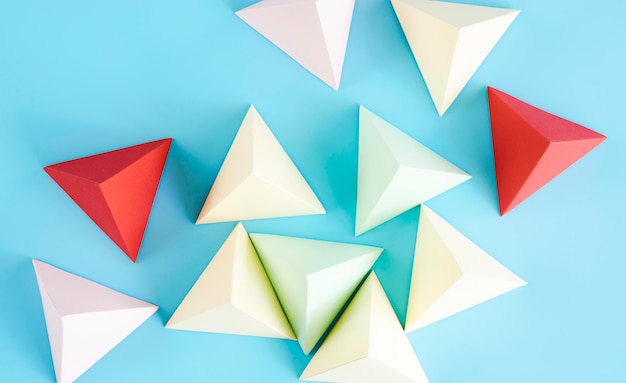 Free Photo top view triangle paper shape collection