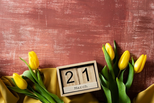 Top view tulips with dated wooden box