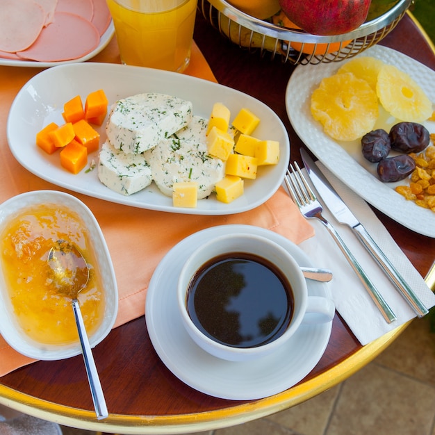 Free Photo top view turkish breakfast with coffee, honey and others.