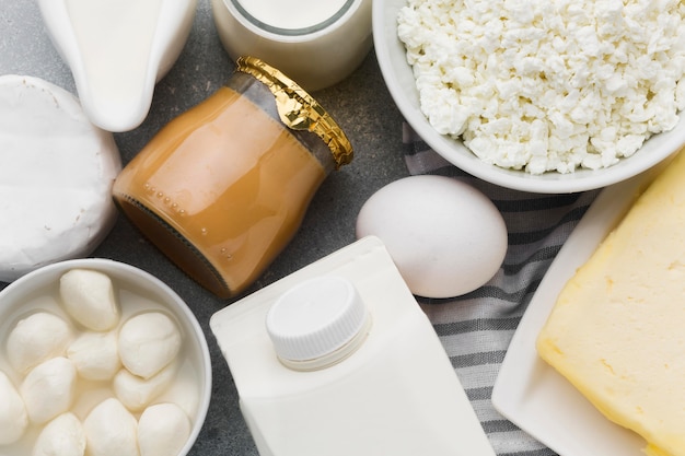 Top view variety of fresh cheese and milk