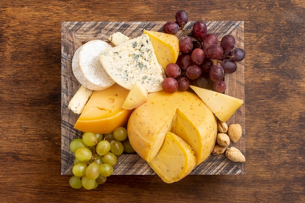 Top view various cheeses on a table