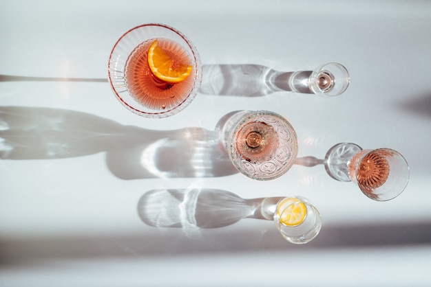 Free photo top view of various cocktails on a white table