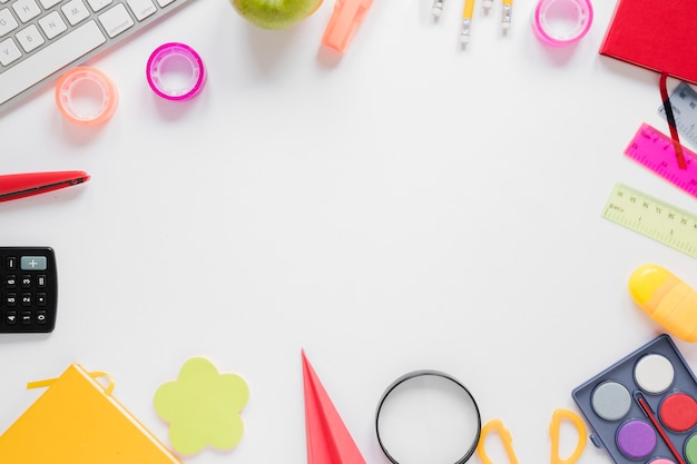 Top view of various school supplies