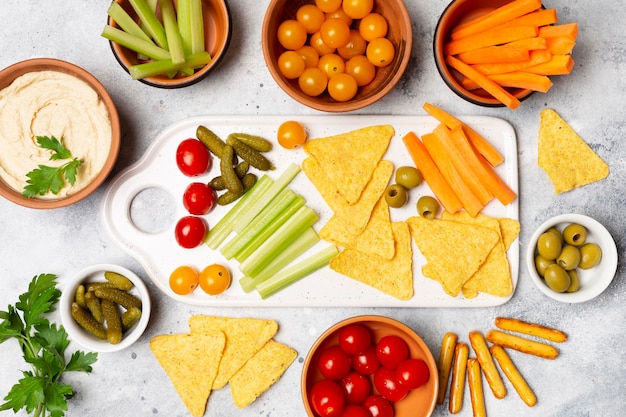 Top view vegetables and chips assortment