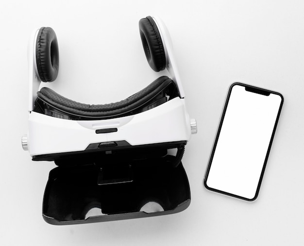 Free photo top view virtual reality headset and mobile