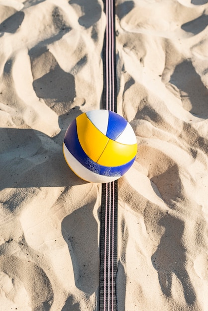 Free Photo top view of volleyball on the beach sand