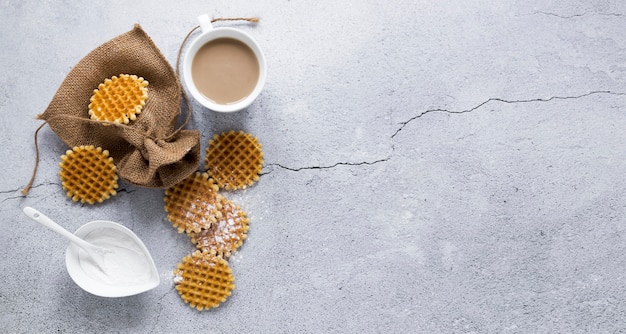 Top view of waffles with coffee and copy space