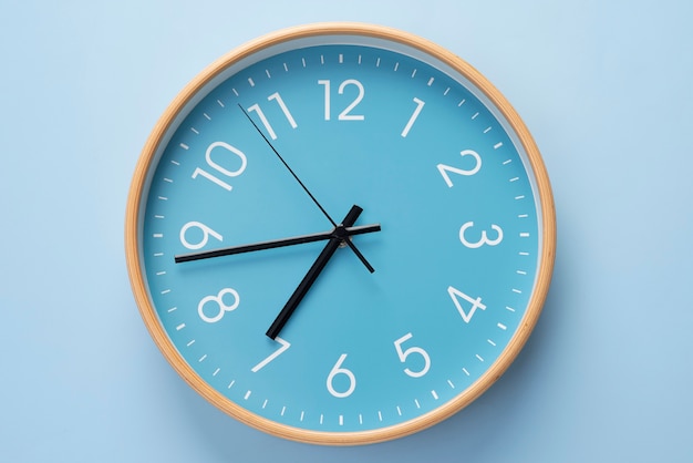 Free Photo top view wall clock still life