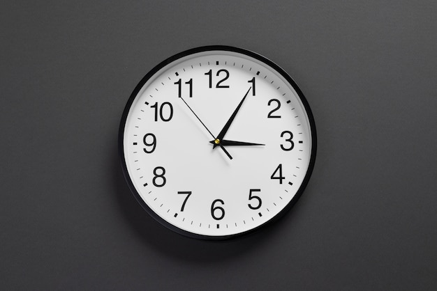 Free photo top view wall clock still life