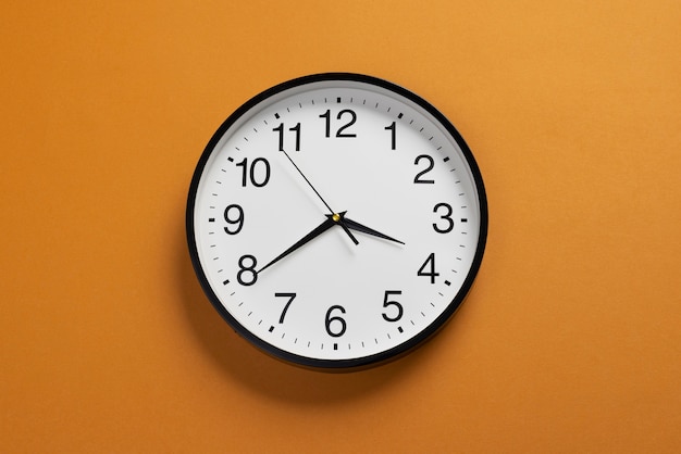 Free Photo top view wall clock still life