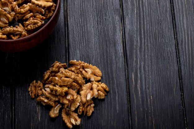 Top view of walnuts with copy space on rustic