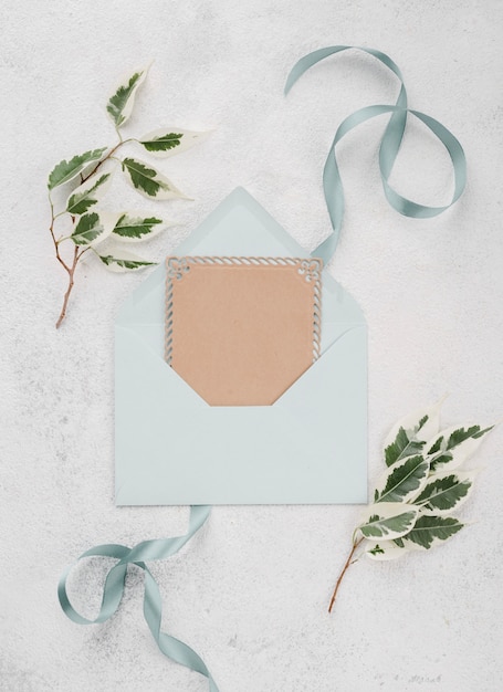 Free photo top view wedding invitation envelope