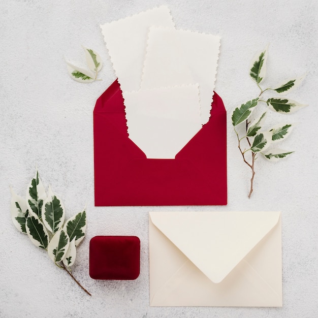 Free photo top view wedding invitation envelopes on the table