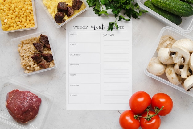 Free photo top view of weekly meal planner