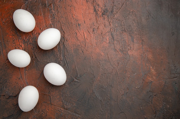 Top view white chicken eggs on dark table animal meal food farm