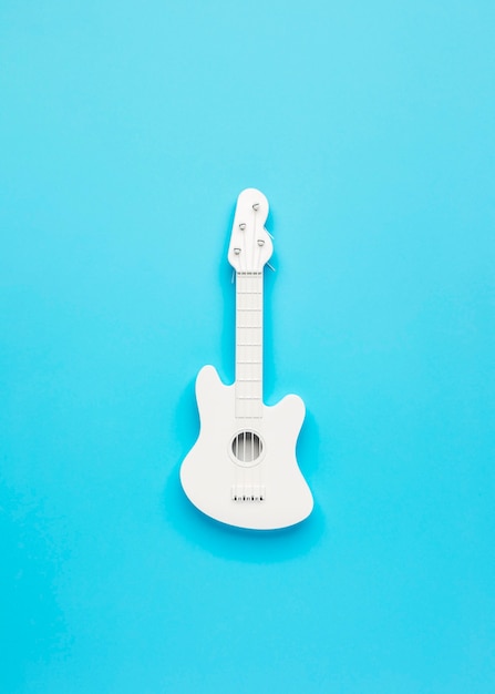 Free photo top view white guitar arrangement