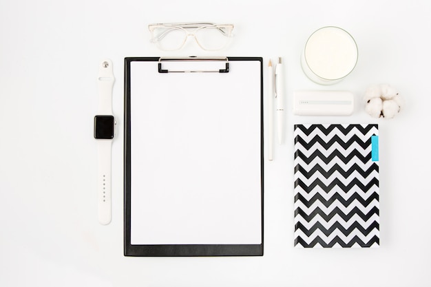 Free photo top view of white office table with notebook