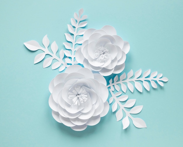 Free photo top view of white paper flowers for women's day