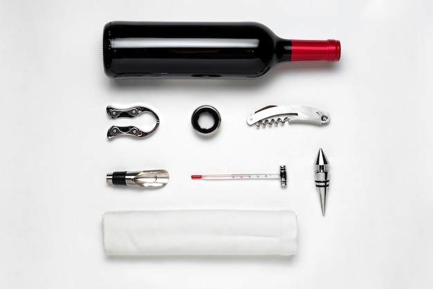 Free photo top view wine bottle and utensils