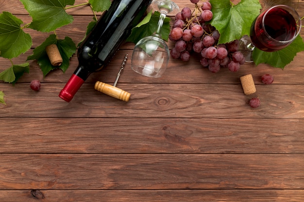 Top view wine bottles on wooden background