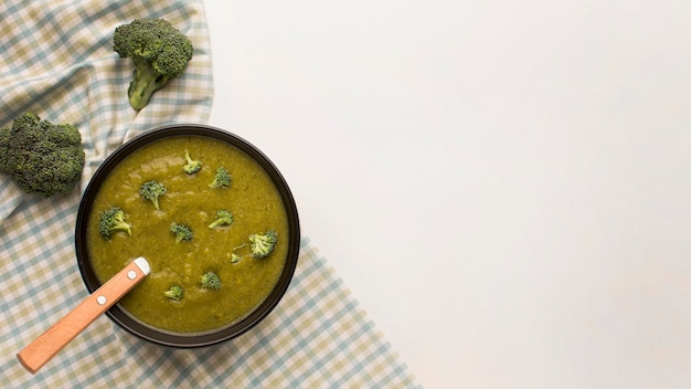 Free photo top view of winter broccoli soup with copy space