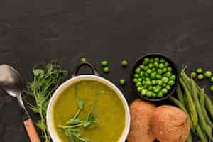 Free photo top view of winter peas soup with bread and copy space