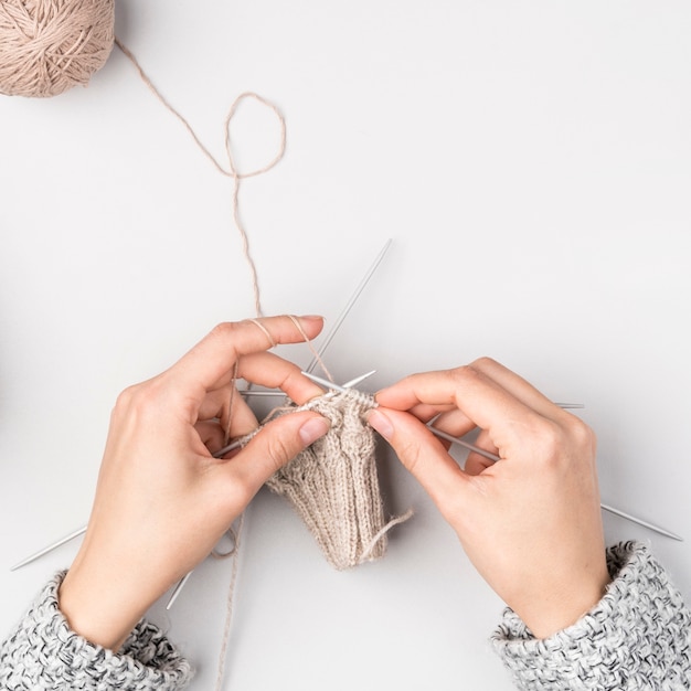 Top view of woman crocheting