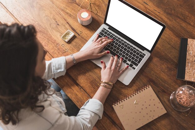 Top view of woman working with her laptop