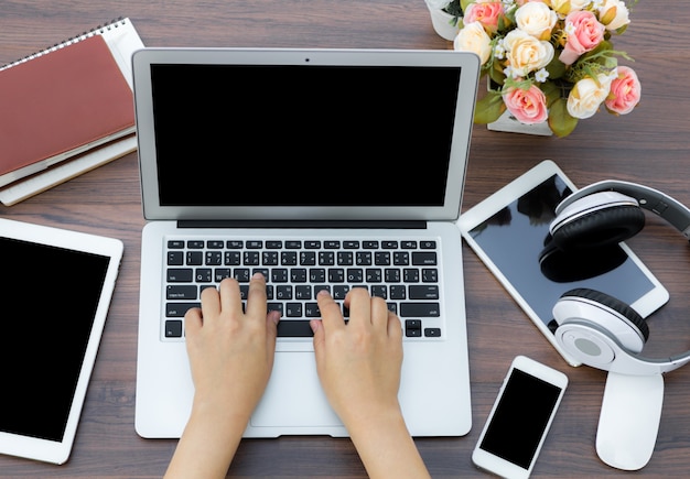 Free photo top view of woman working with laptop