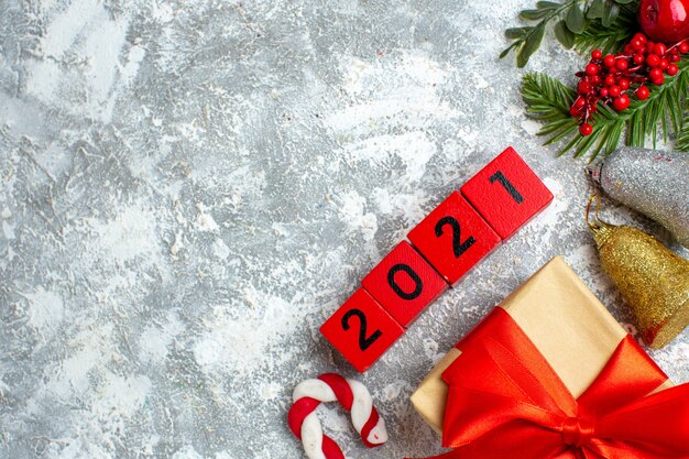 Top view wood blocks xmas details on grey white background