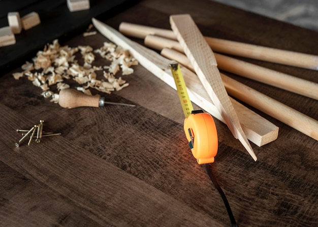 Free Photo top view wood tools on desk