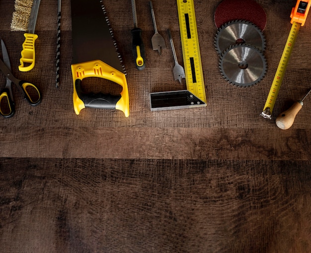 Free photo top view wood tools on desk