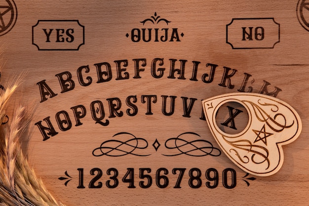 Free photo top view wooden ouija board