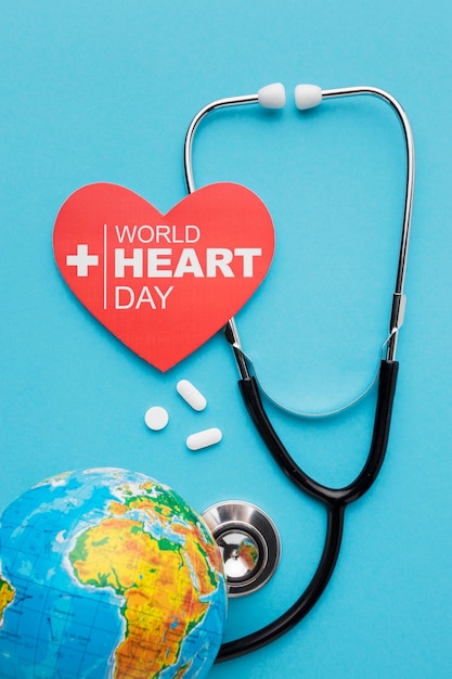 Free Photo top view world heart day concept with earth