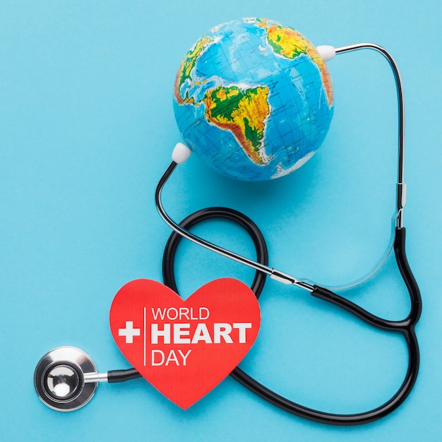 Free Photo top view world heart day concept with globe