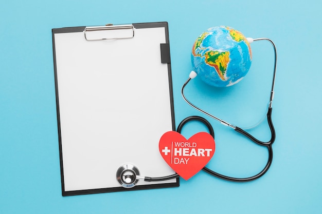 Free Photo top view world heart day concept with stethoscope