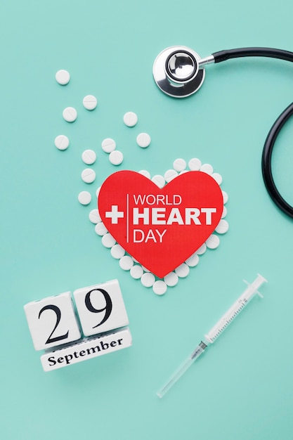 Free Photo top view world heart day concept with stethoscope