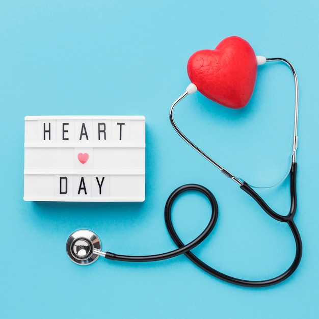 Free photo top view world heart day with stethoscope