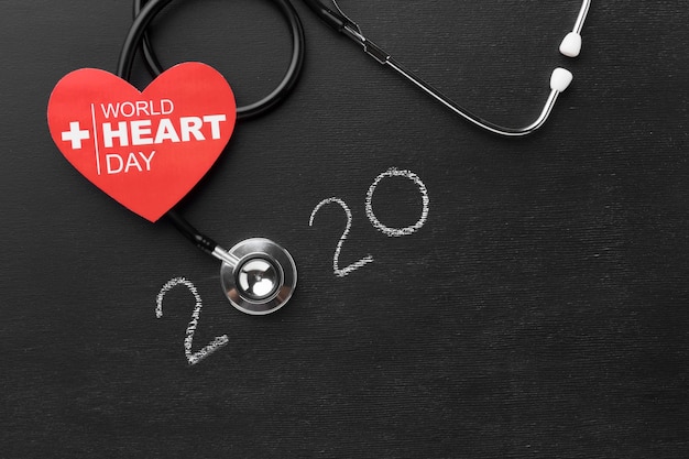 Free photo top view world heart day with stethoscope