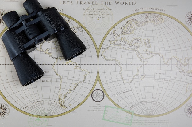 Top view world map and binocular