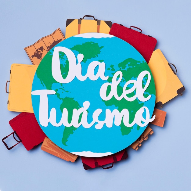 Free Photo top view world tourism day with lettering